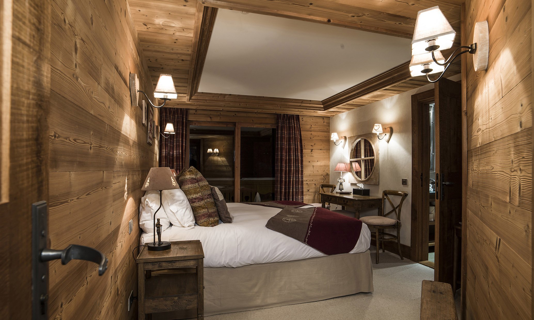 One of the comfortable bedrooms in Chalet Lapin Blanc Meribel