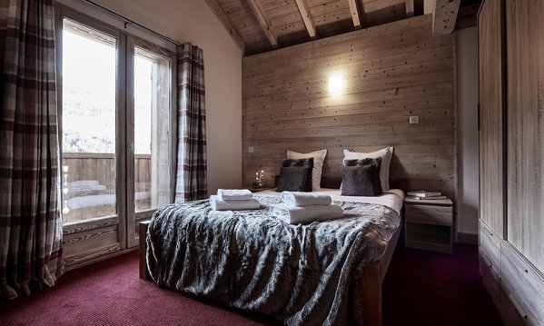 A Double bedroom in Chalet Le Bouquetin in Meribel