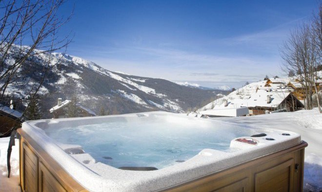 Luxury hot tub with magnificent views at Club Chalet Pierre