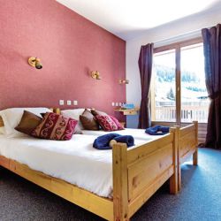 A bedroom in Hotel Les Grangettes Meribel