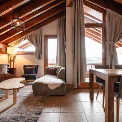 The Living and dining area in Chalet Mathilde, Val Thorens