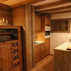 Kitchen area in apartment Jardin d'Hiver
