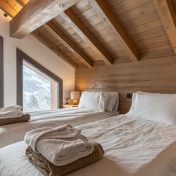 One of the Twin Bedooms in Ski in/Ski out Chalet Evergreen Meribel