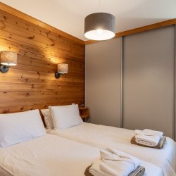 One of the Twin Rooms in Ski in/Ski out Chalet Evergreen Meribel