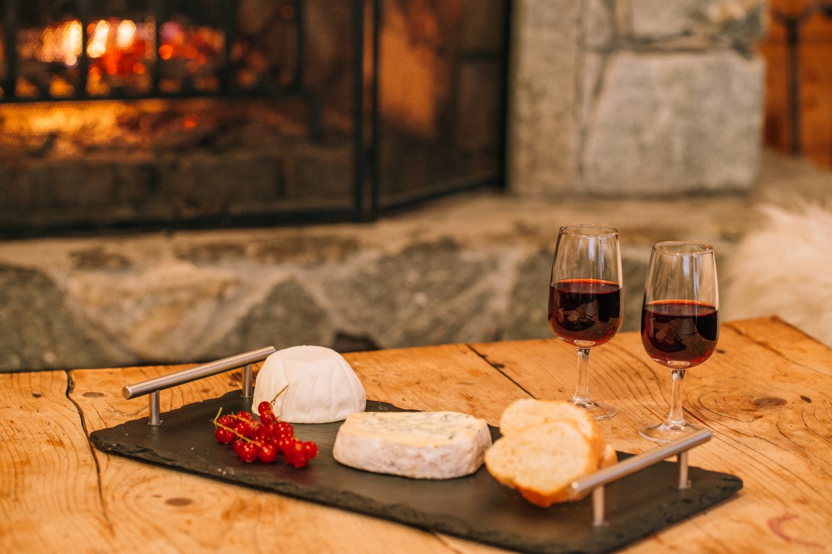 Cheese and wine beside the fire