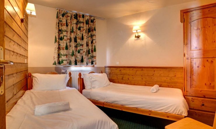 Chalet Aries twin bedroom