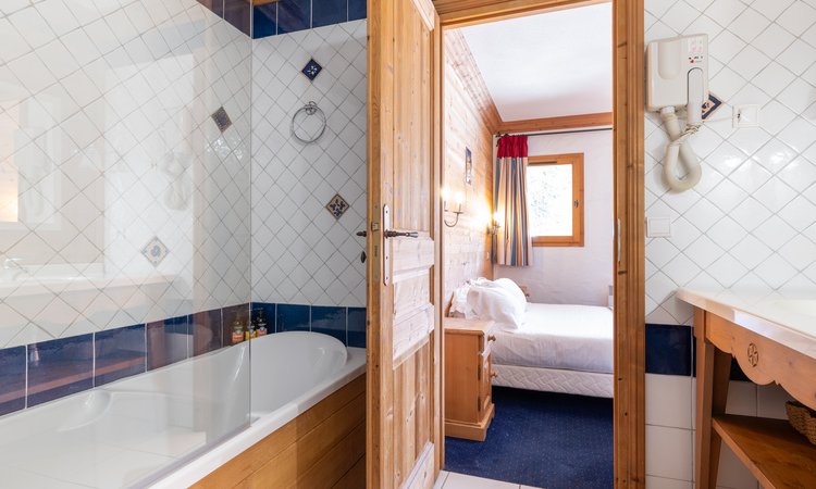 One of the ensuite bathrooms in Chalet Oxalys in Meribel