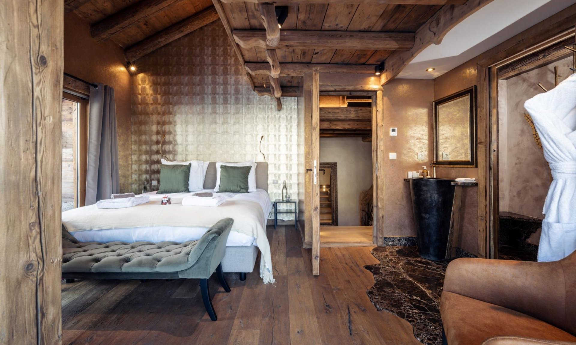A spacious bedroom in Catered Chalet Cheval Blanc Meribel Le Raffort