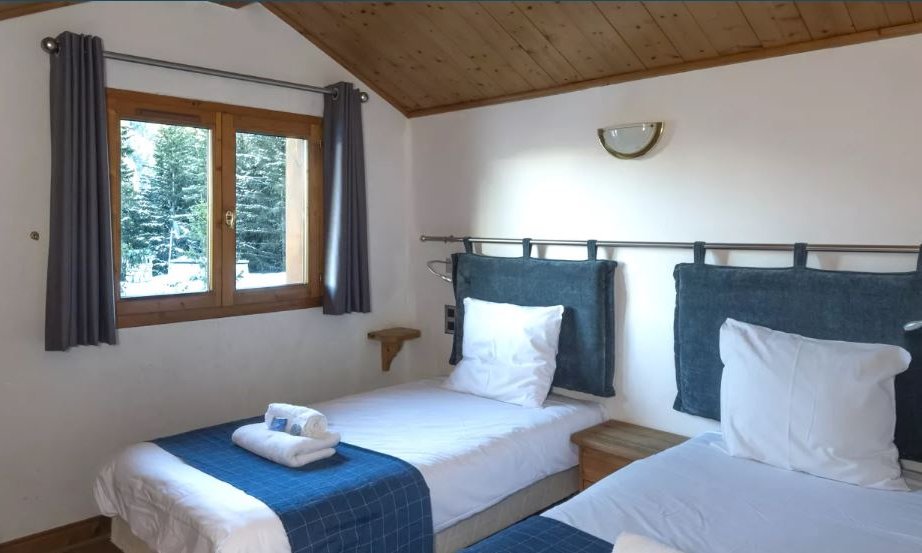 One of the bedrooms in Chalet Rikiki Courchevel Moriond