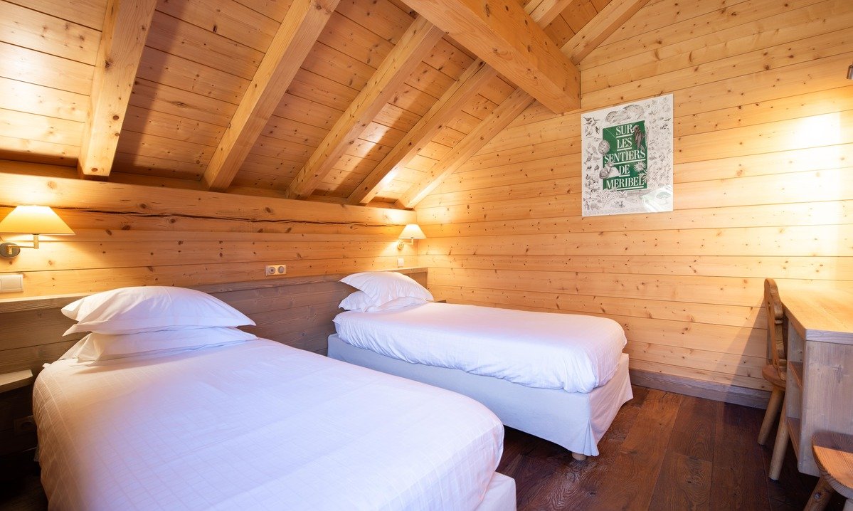 A comfortable Bedroom in Chalet L'Ancolie Meribel
