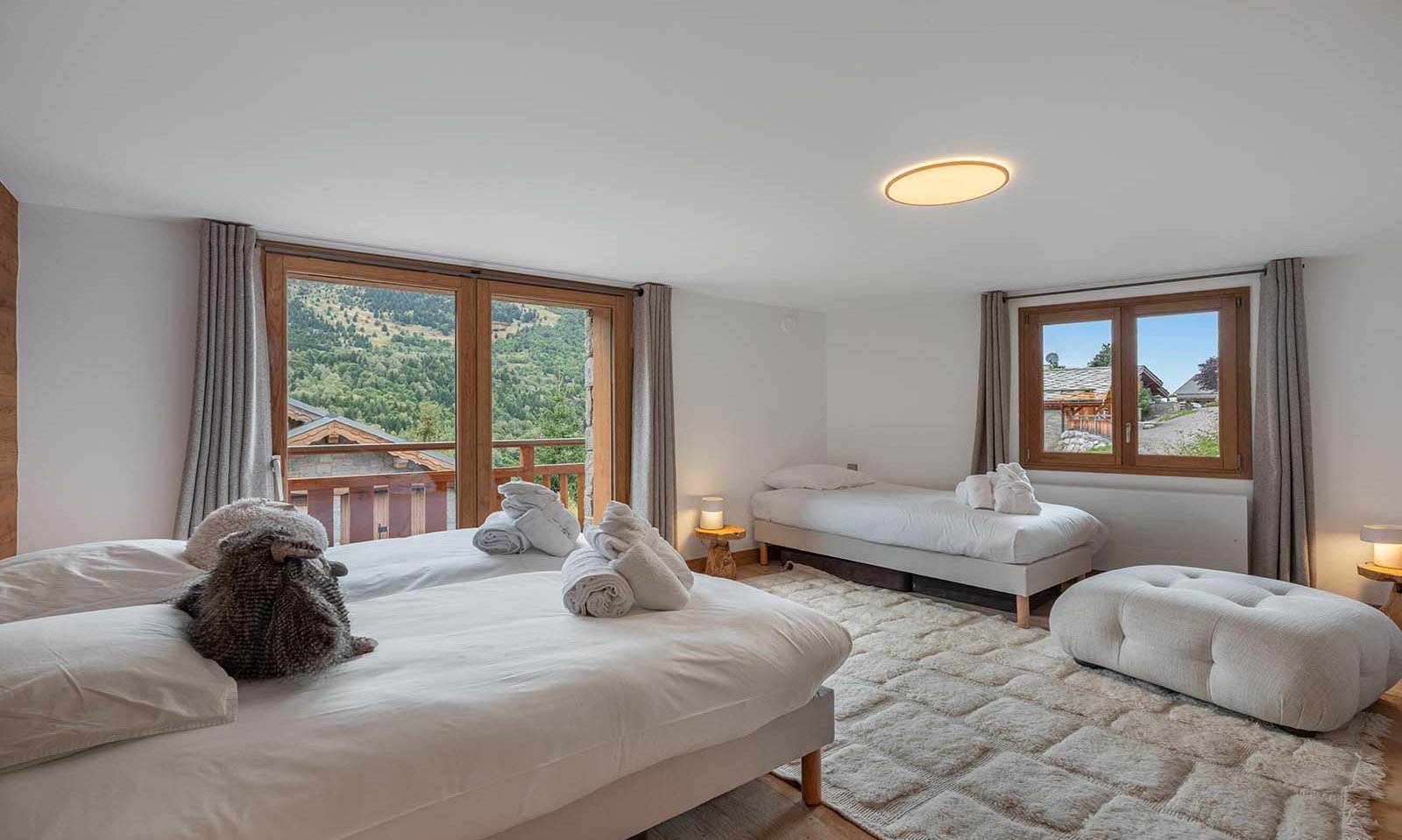 One of the bedrooms in Chalet Etoile des Neiges Meribel