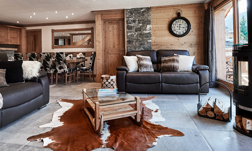 Living room with Stove in Chalet Chamois in Meribel