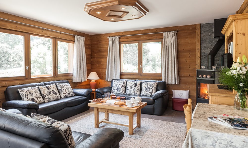 The Living room with stove in Chalet Covie Meribel Les Allues