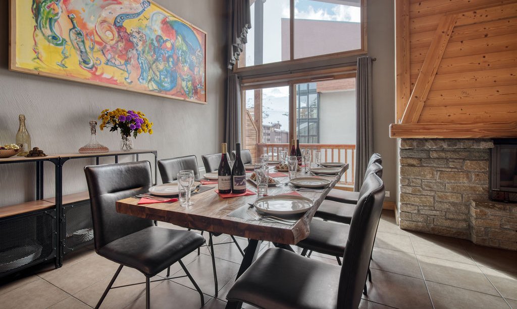 The comfortable dining area in Catered Chalet Sabot Penthouse in Val Thorens