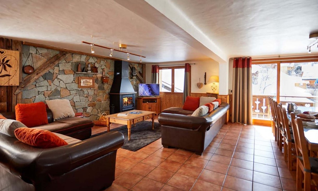 The Living area with fireplace in Chalet Daurel, Meribel Centre