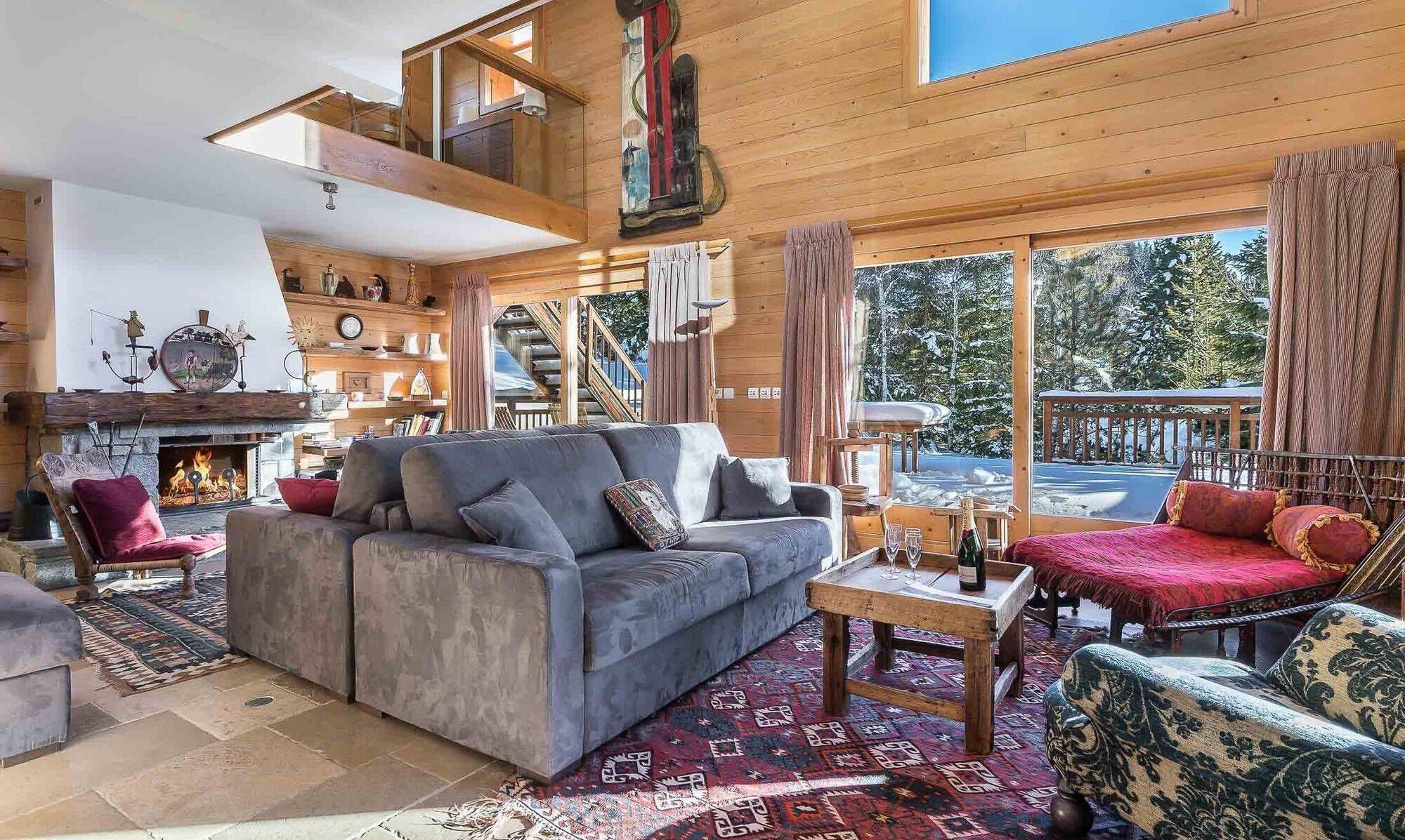 The Living area with fireplace in Chalet Eric Meribel Centre