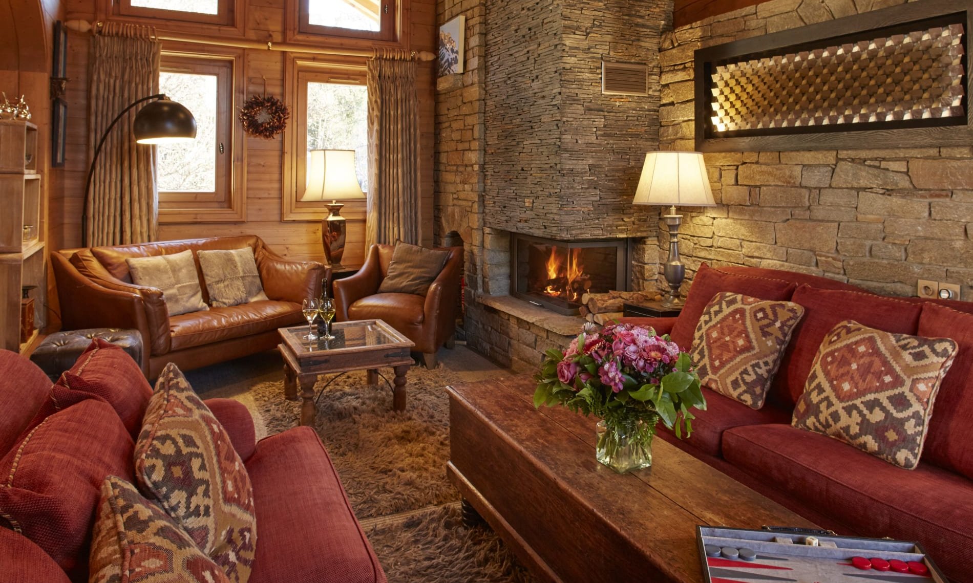 The comfortable Living area with fireplace in Chalet La Petite Pia Meribel