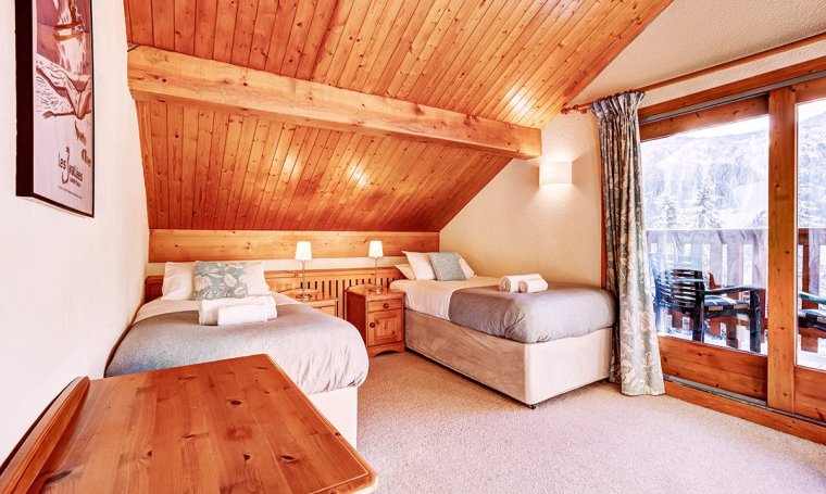 One of the comfortable Twin bedrooms in Chalet Veronica Meribel