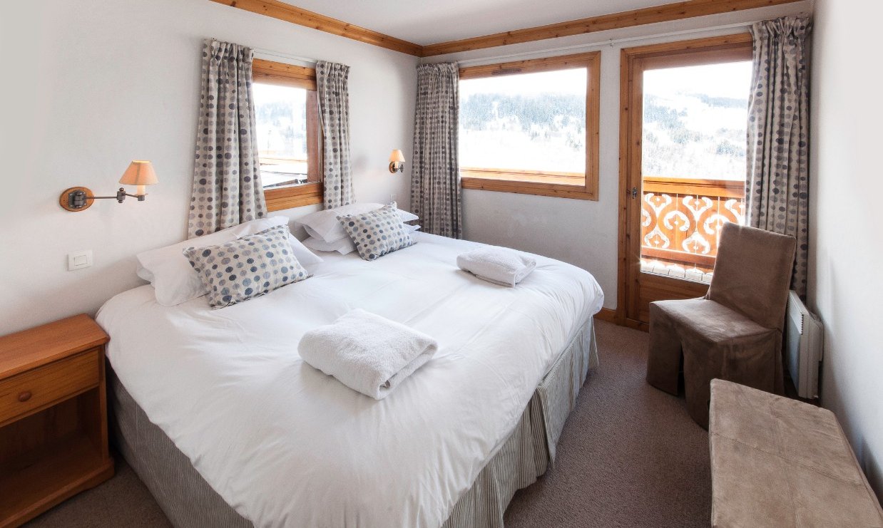 A double bedroom in Chalet Virage Meribel