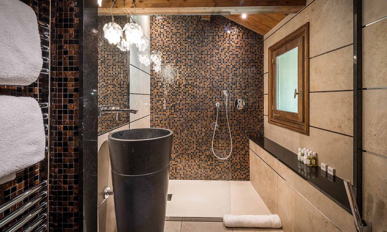 A shower room in Chalet Mariefleur in Meribel