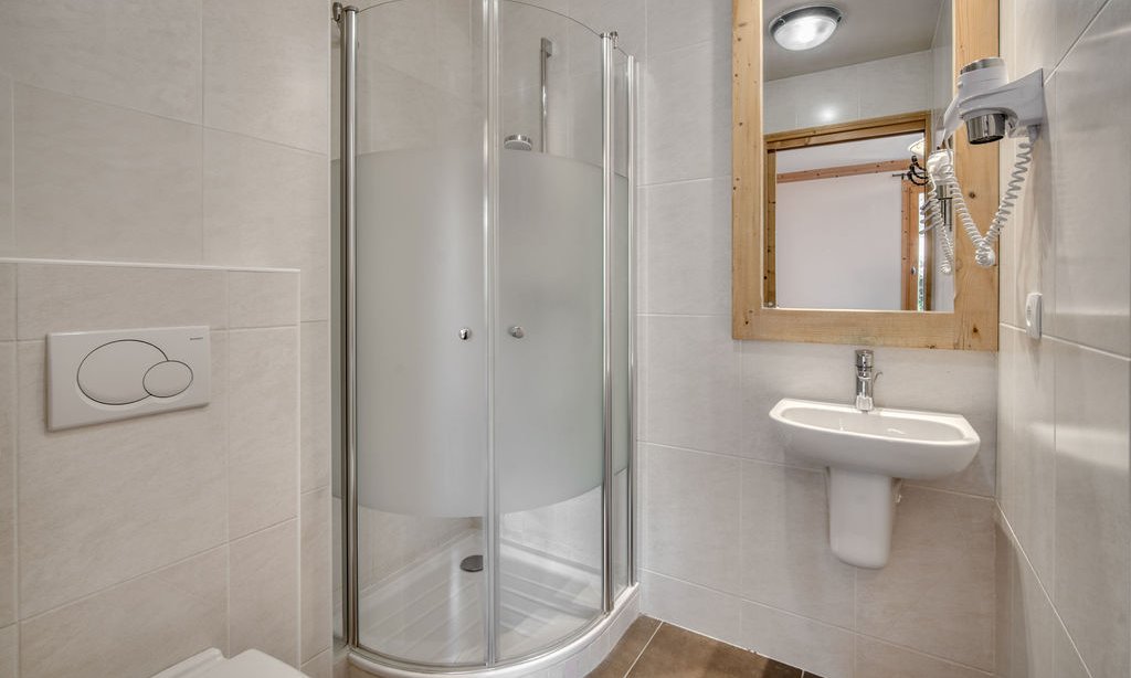A Shower room in Catered Chalet Sabot Val Thorens