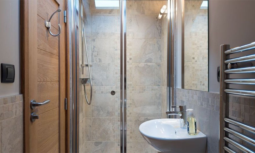 A Shower room in Chalet Montana in Meribel Centre