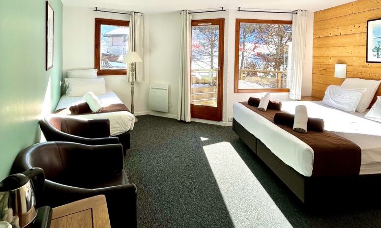 A Triple Room with balcony in Hotel Le Montana in La Tania
