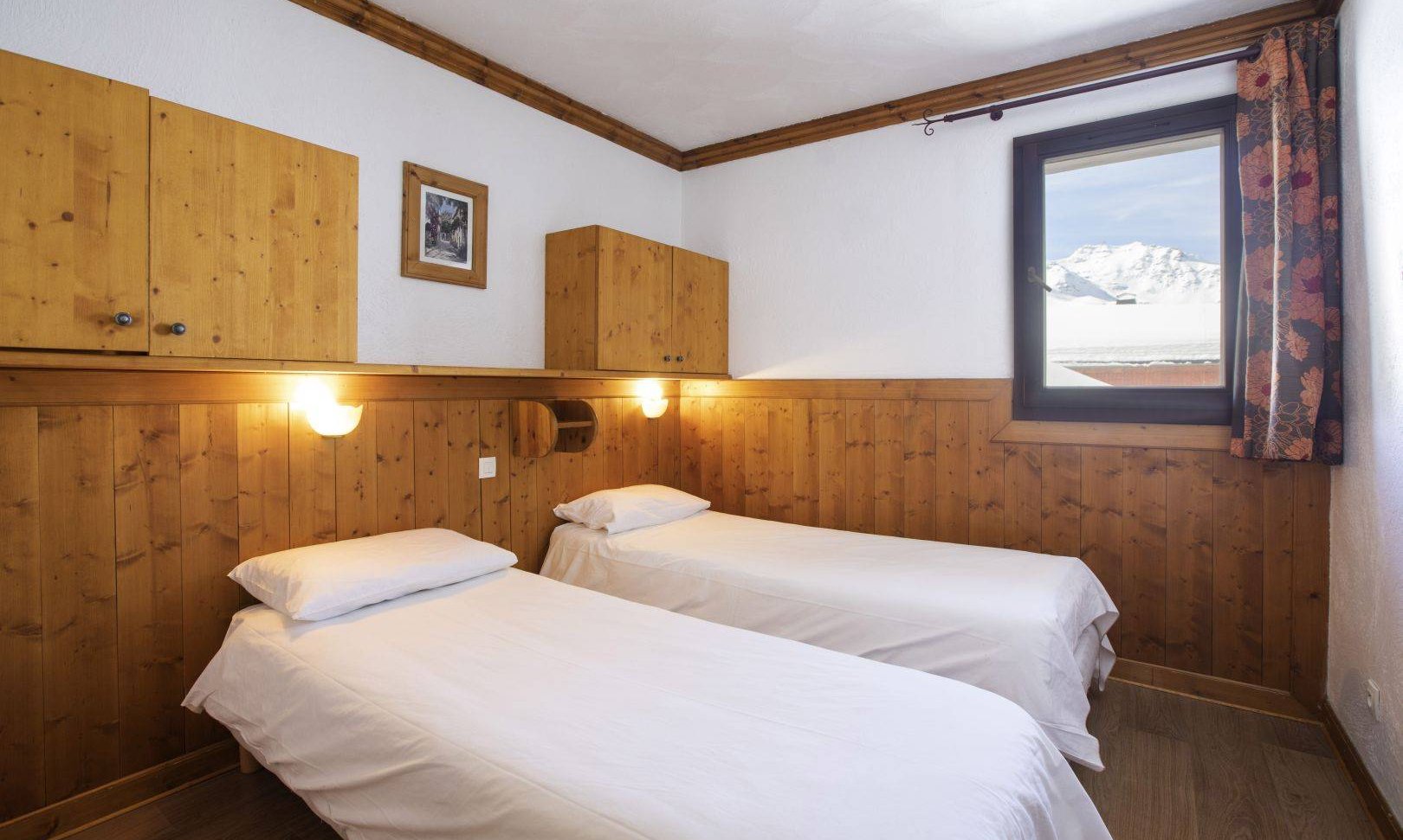 A Twin bedroom in Chalet des Neiges Hermine Val Thorens