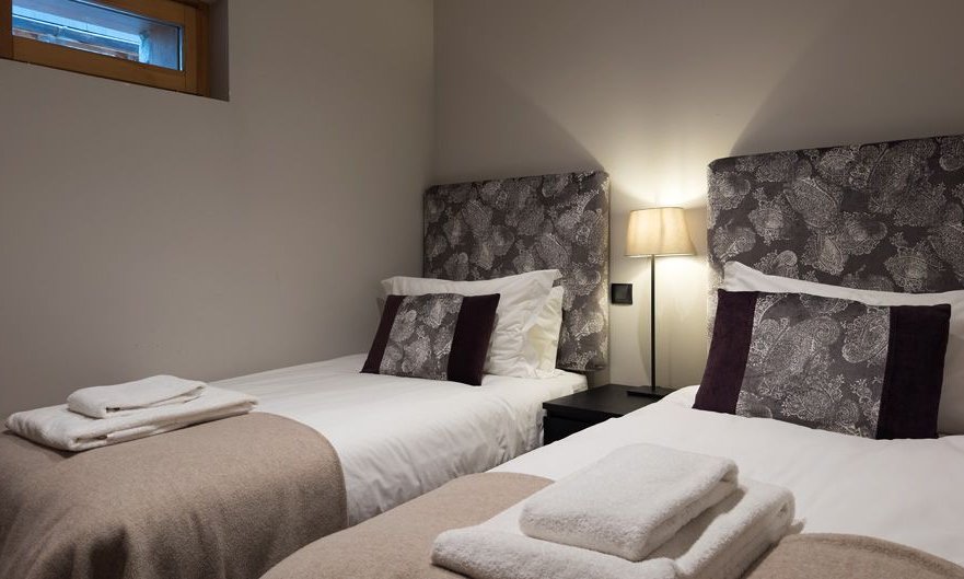 A Twin bedroom in Chalet Montana in Meribel Centre