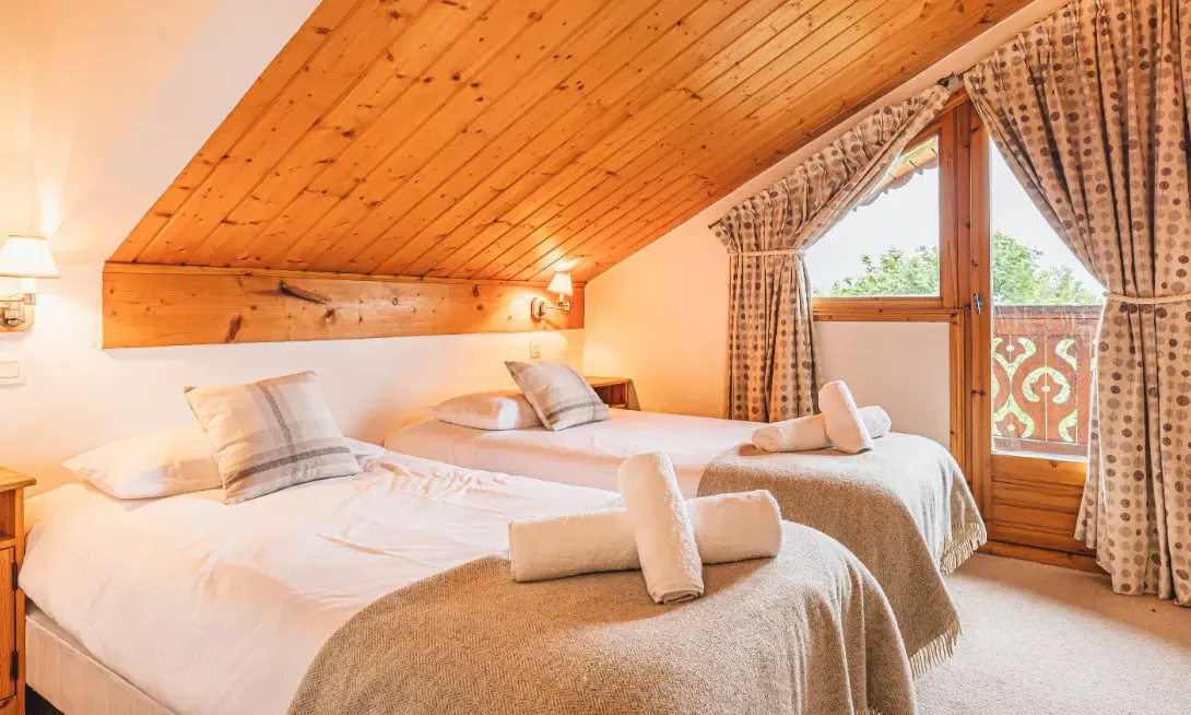 One of the twin bedrooms in Chalet Virage in Meribel Centre