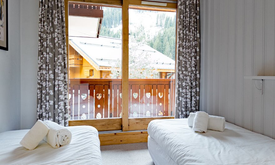 One of the twin bedrooms in Apartment Grand Meribel Centre
