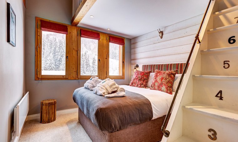 One of the double bedrooms in Chalet Quatre Meules Meribel