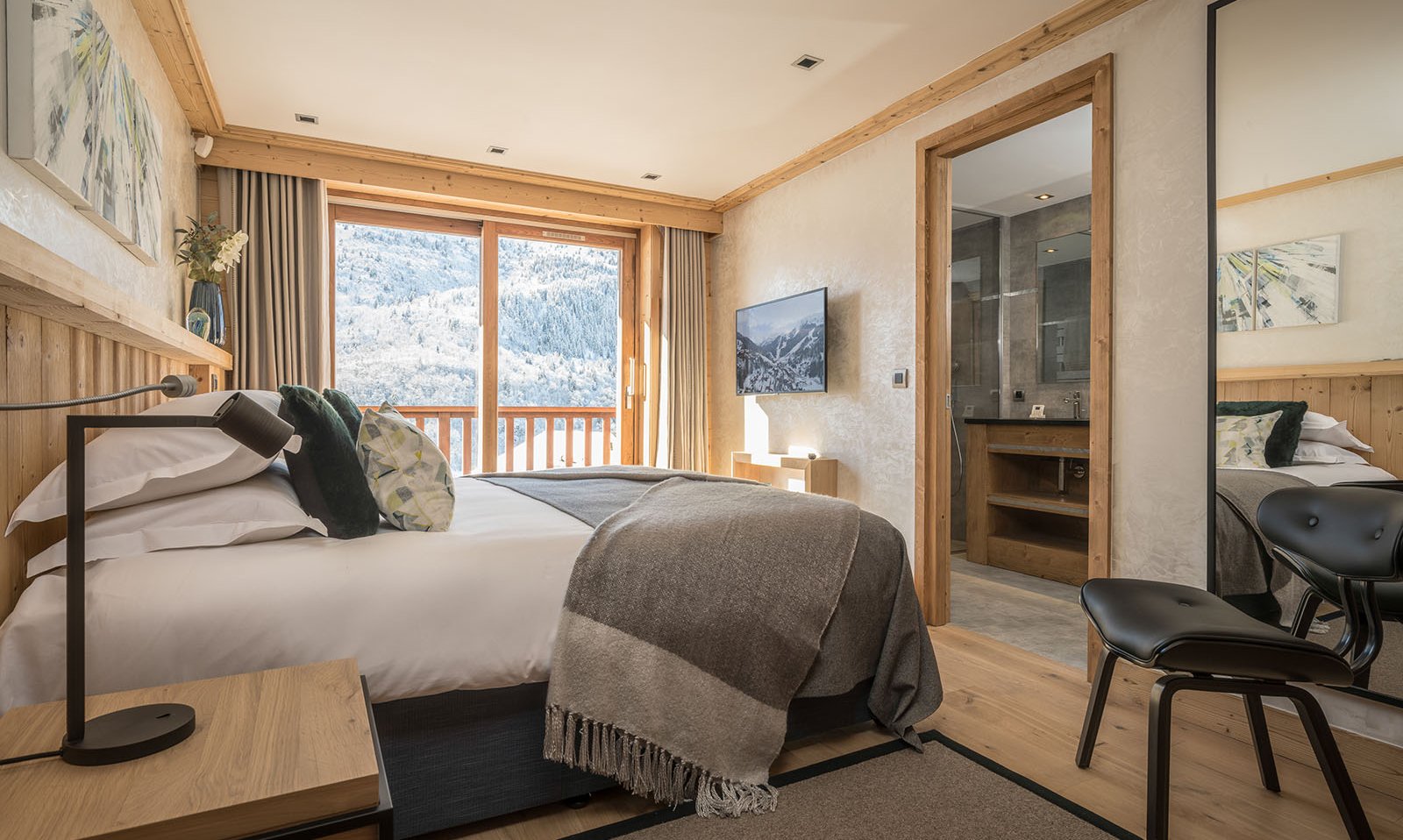 One the luxury bedrooms in Chalet Serendipity Meribel Village