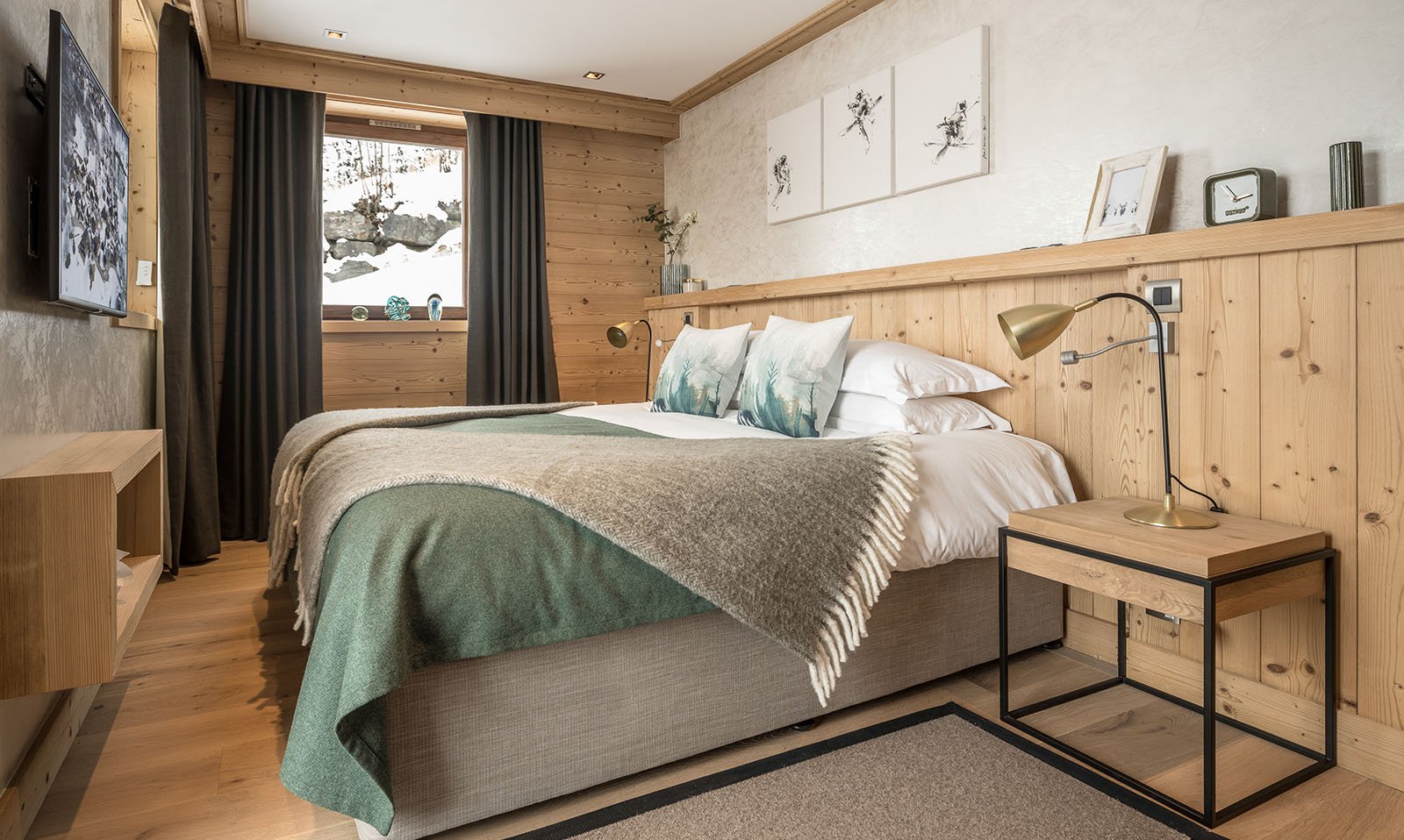 One the luxurious bedrooms in Chalet Serendipity Meribel Village