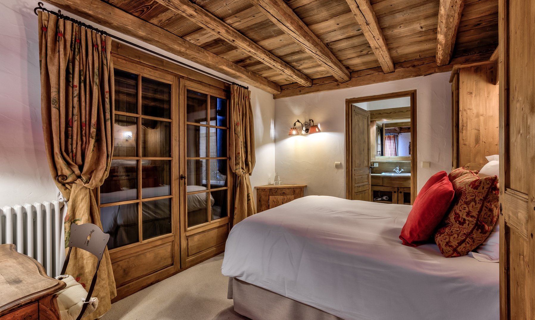 One of the lovely Bedrooms in Chalet Amarena Meribel