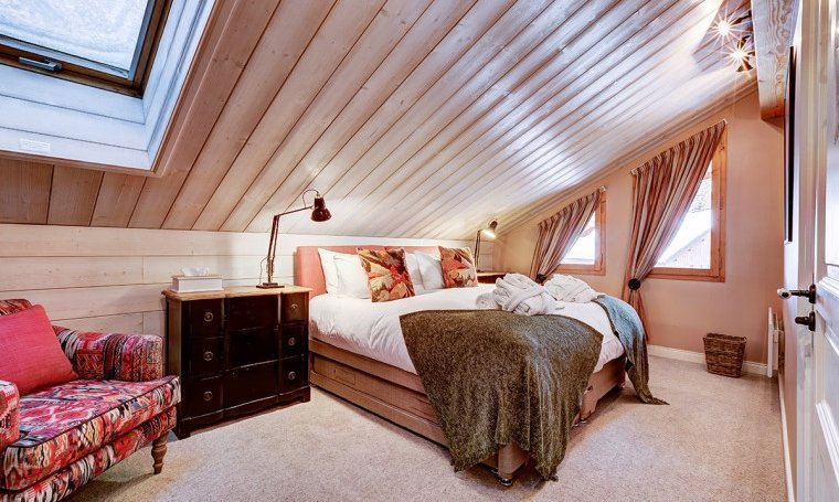 One of the comfortable bedrooms in Chalet Quatre Meules Meribel