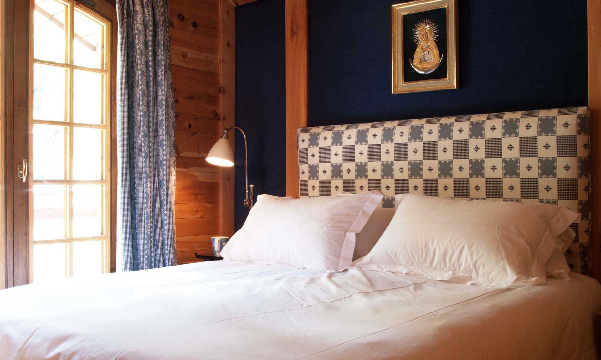 One of the comfortable bedrooms in Chalet La Varappe in Meribel