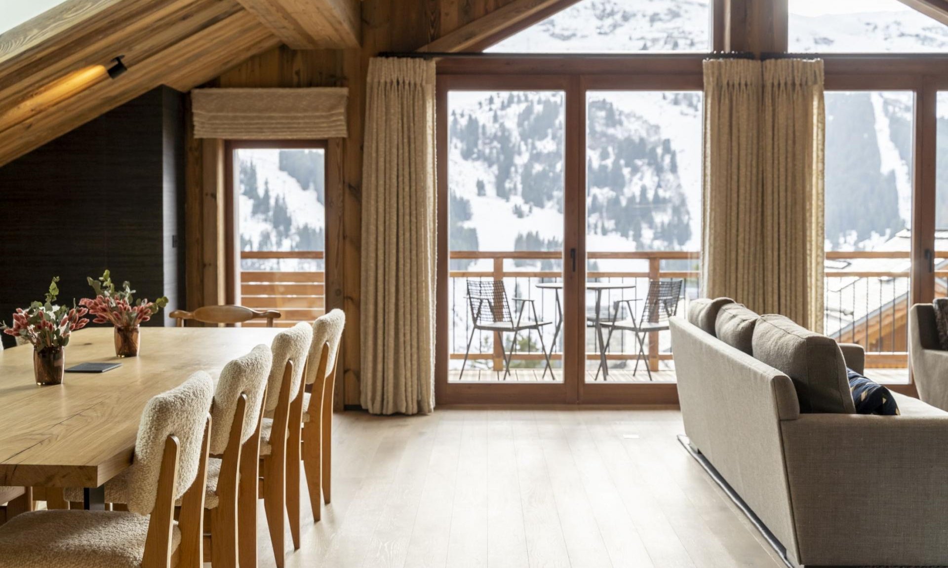 The dining and living areas in Chalet Apartment Le Cygne Meribel Centre