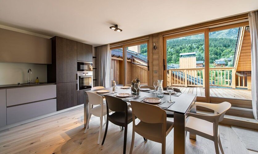 The Kitchen and dining area in Apartment Le Glaciers 12 Meribel