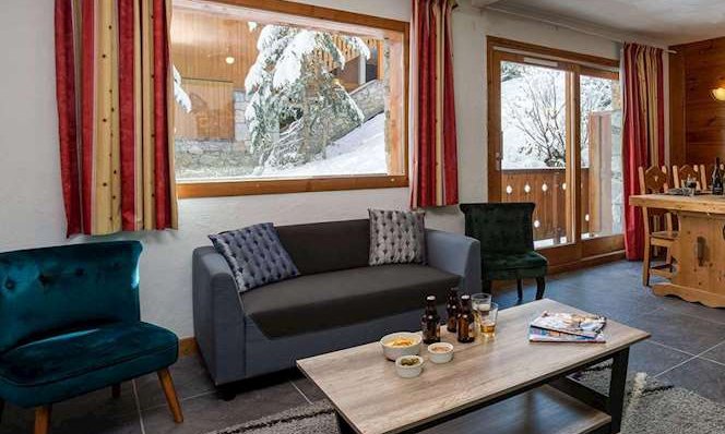 The living and dining area in Chalet Nico Meribel Mottaret