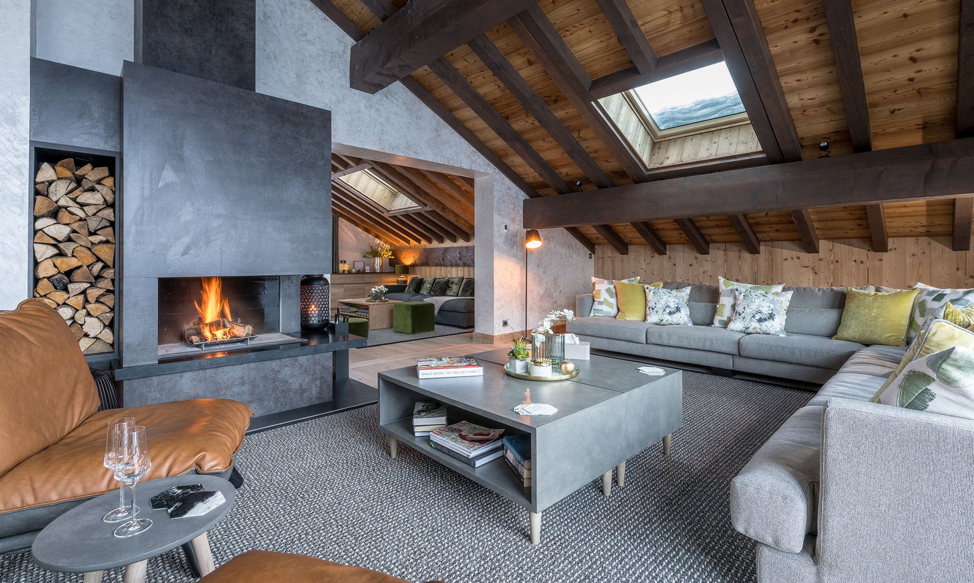 The living room and fireplace in Chalet Serendipity Meribel Village
