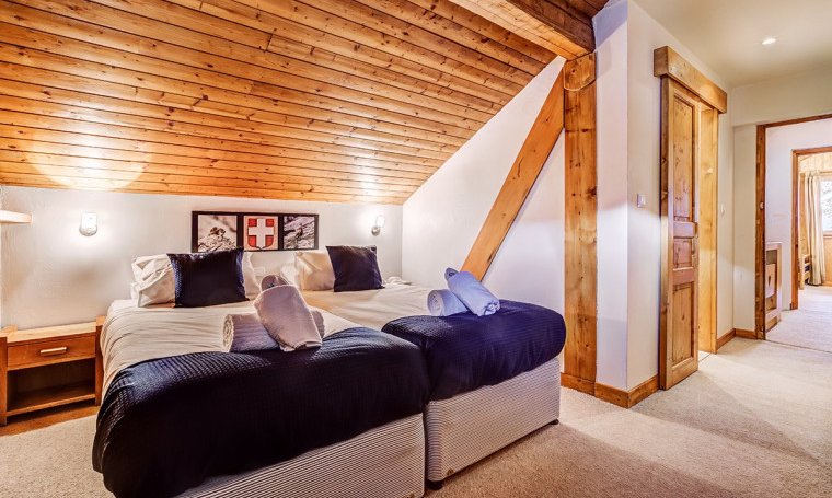 One of the comfortable  bedrooms in Chalet Cecilia Meribel