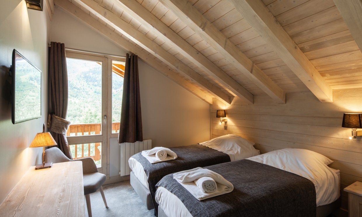 One of the bedrooms in Chalet Chardon Meribel