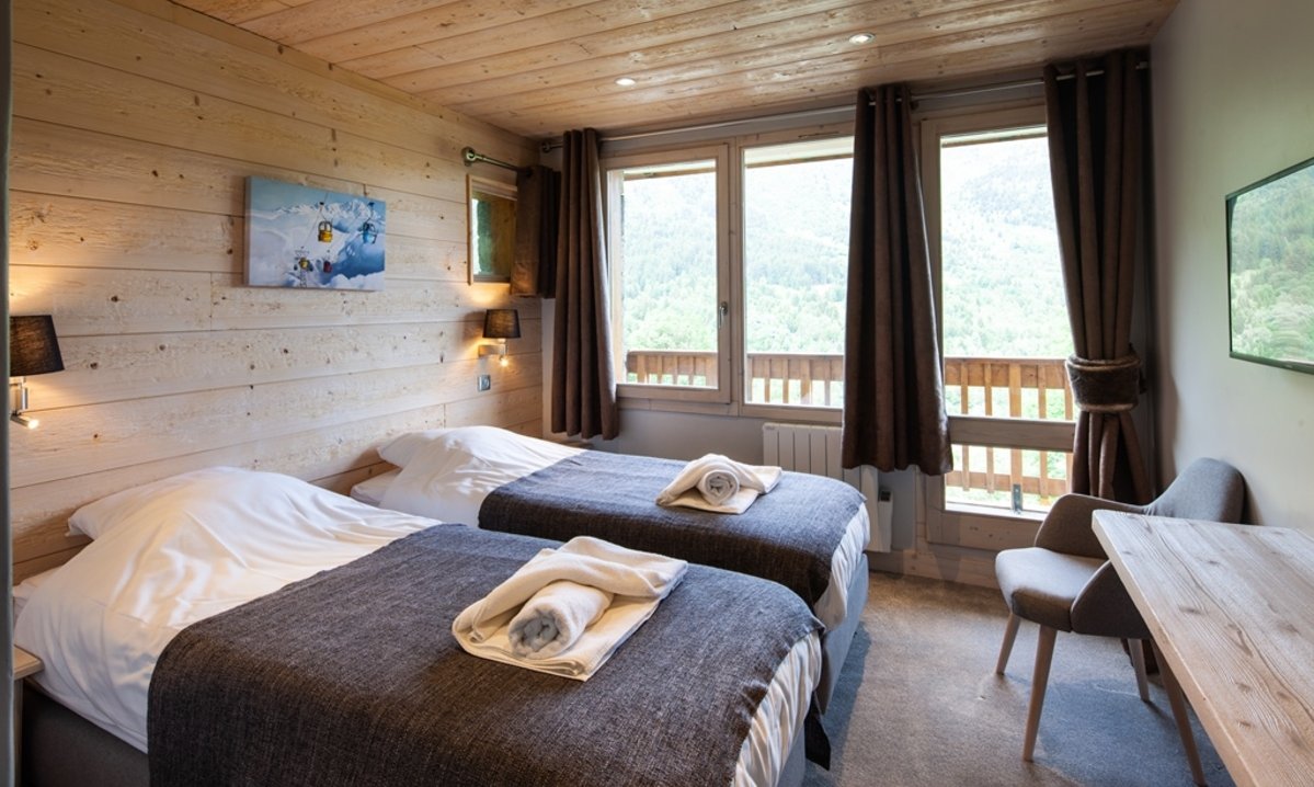 One of the bedrooms in Chalet Chardon Meribel