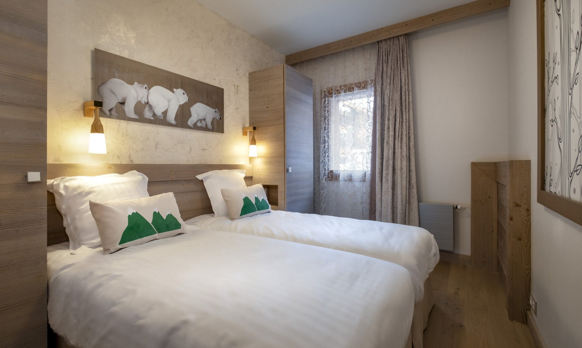 A comfortable Twin bedroom in Residence L'Hevana Meribel