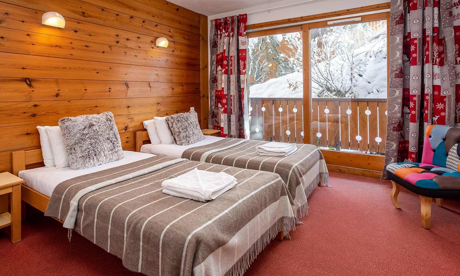 A Twin bedroom in Chalet Nico Meribel Mottaret