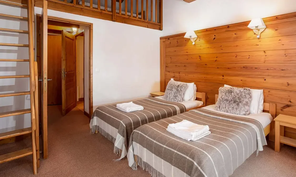 One of the bedrooms in Catered Chalet Pierre Meribel Mottaret