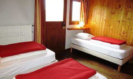Triple bedroom in Chalet Altitude 1600 in Meribel