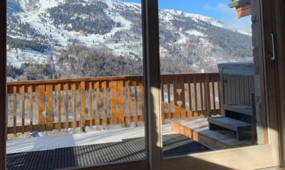 Balcony and hot tub at Chalet Chardon in Meribel
