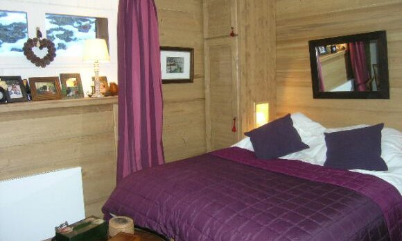 A double bedroom in apartment Le Coeur de Meribel